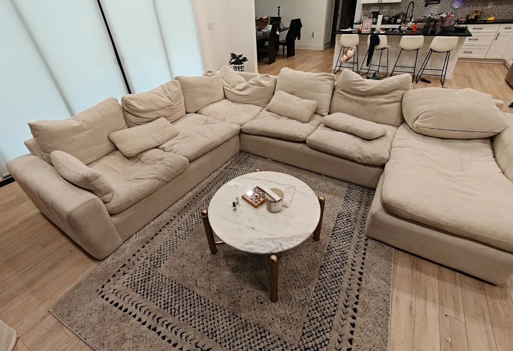 The same large light sectional before cleaning