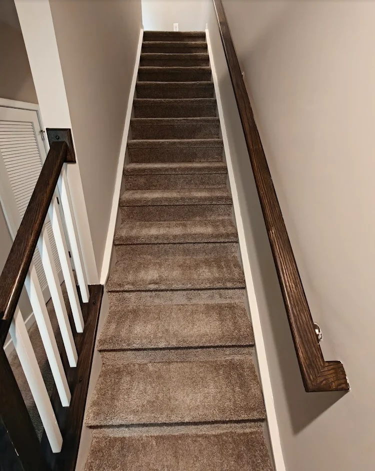 Carpeted stairs · May 31, 2026 after