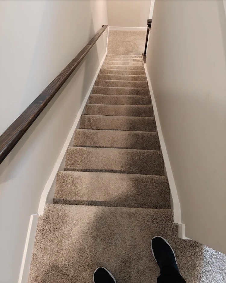 Carpeted stairs · May 31, 2026 before